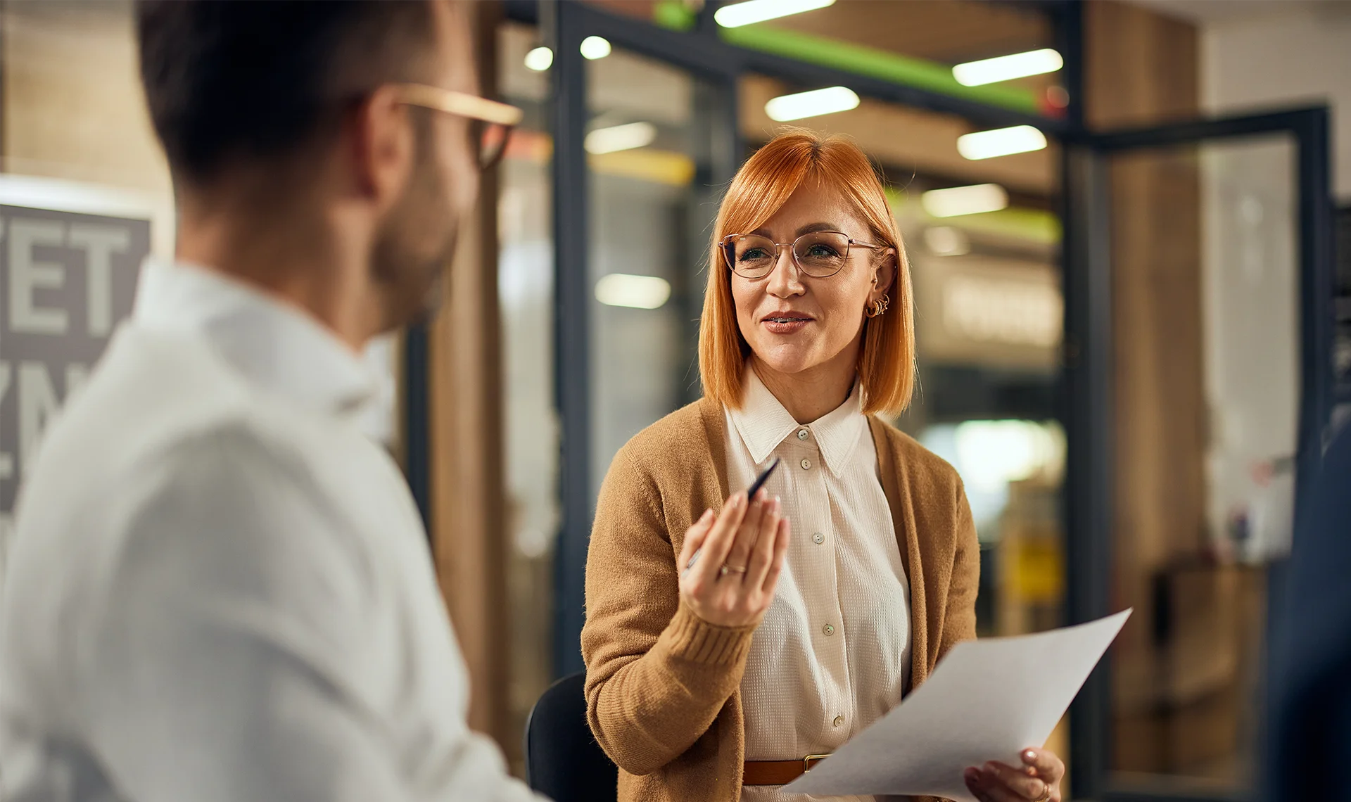 employer reviewing forms with employee