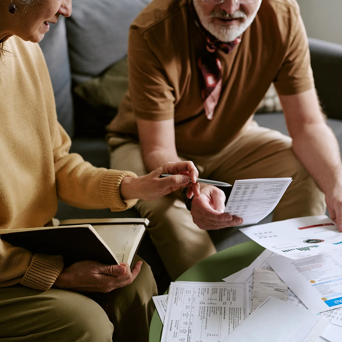 mature couple reviewing their retirement portfolio together