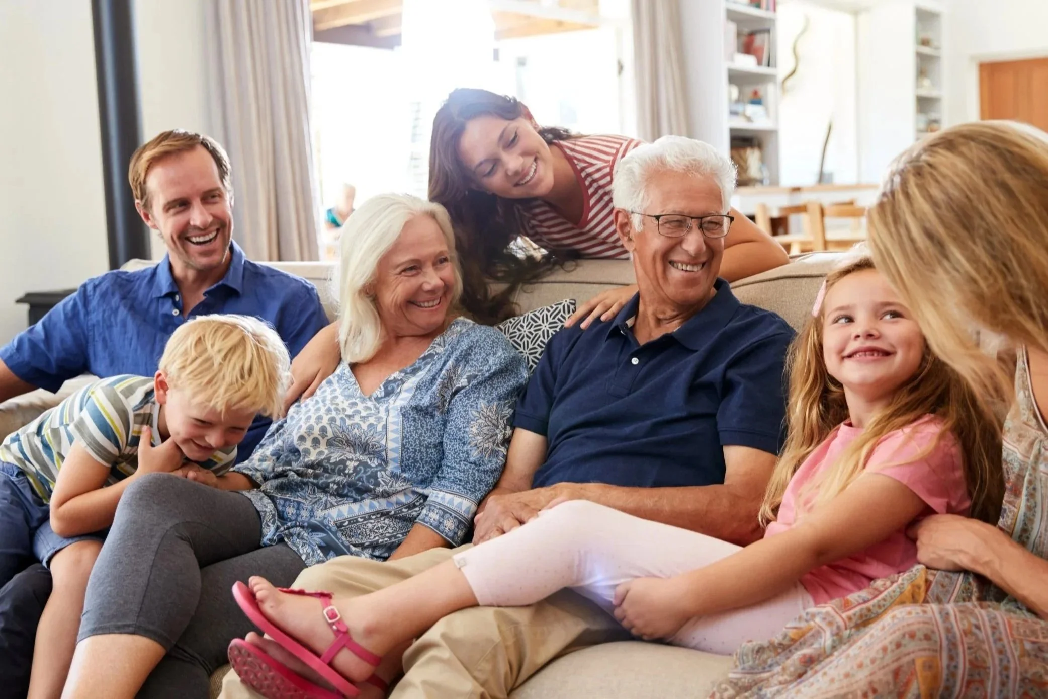 family sitting together enjoying time together
