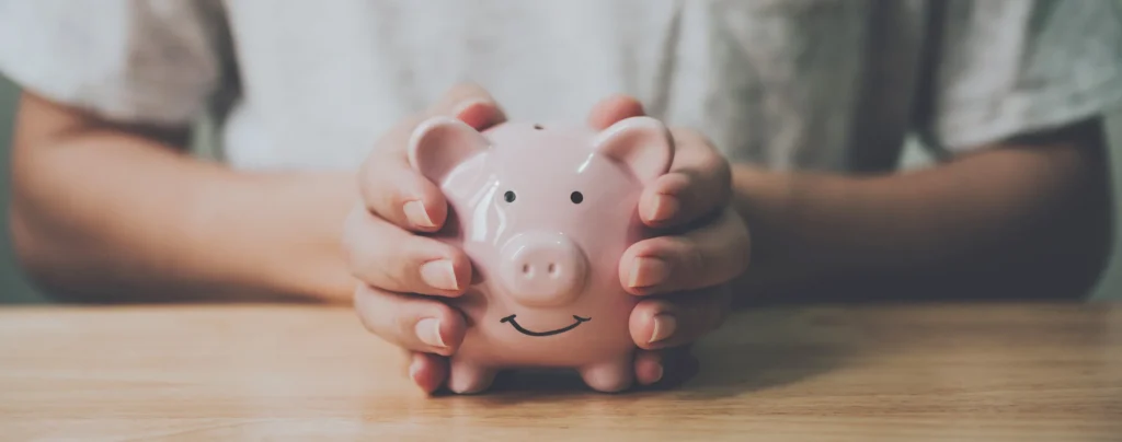 holding piggy bank