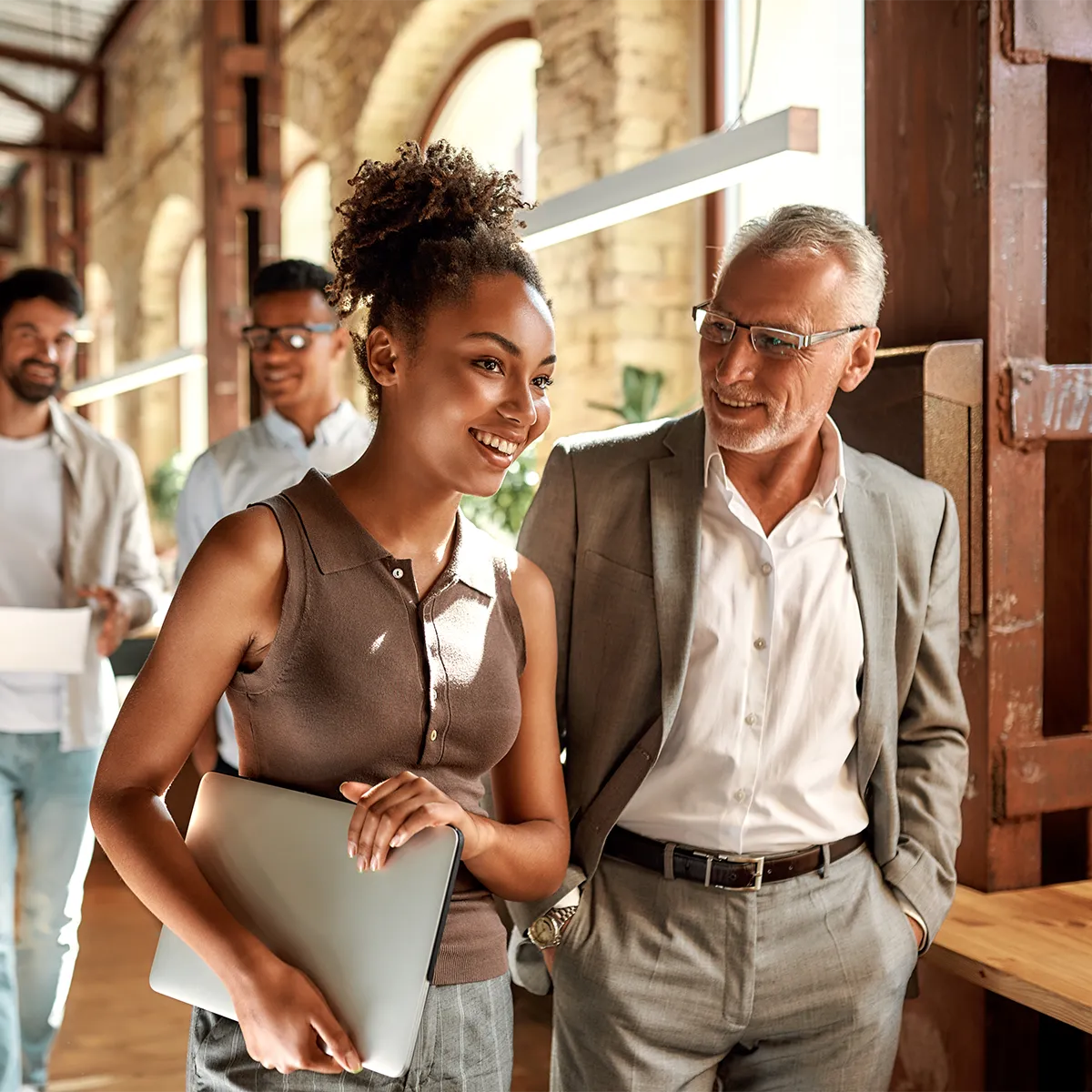 confident colleagues discussing retirement plans