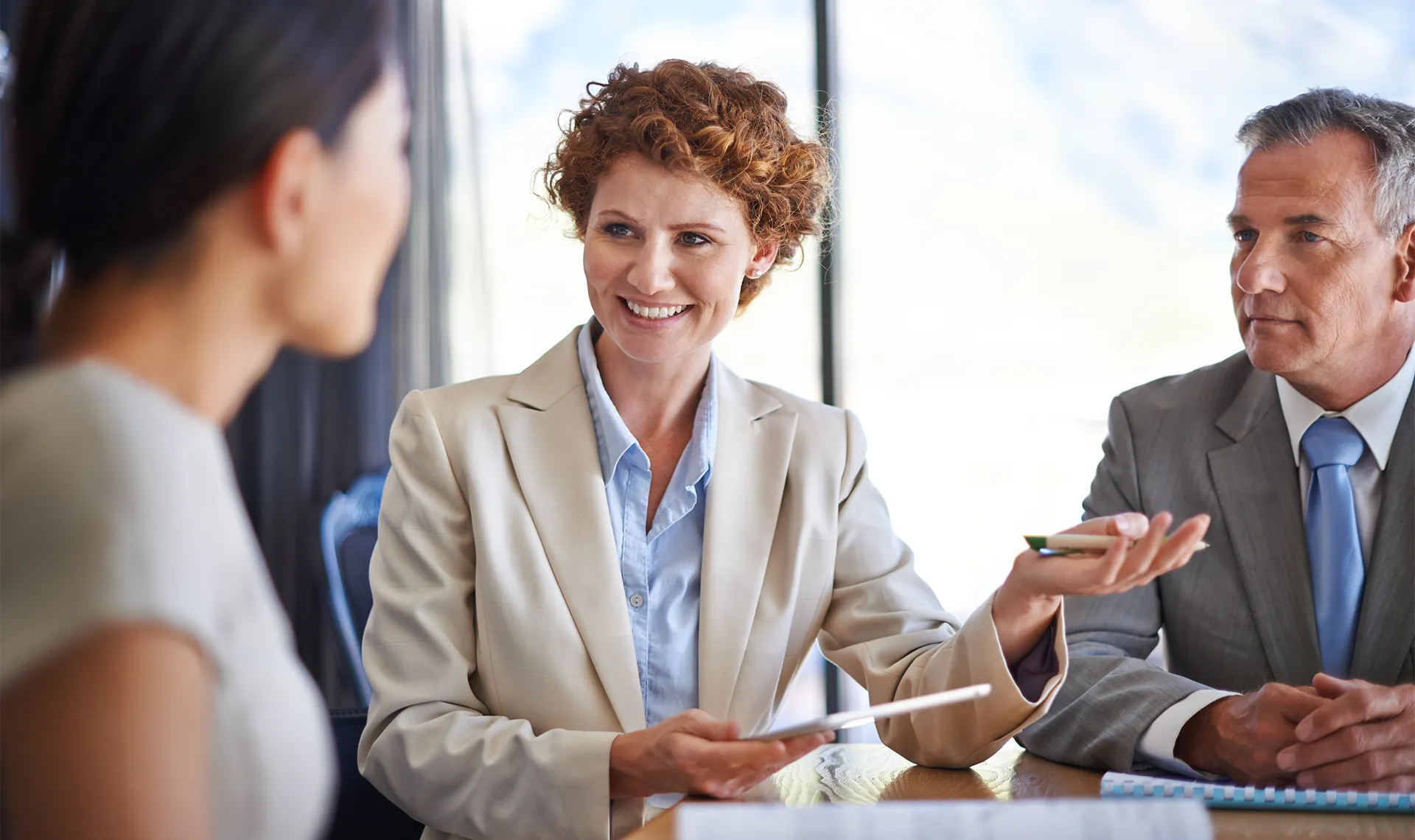 financial planning client meeting to review investment information for retirement plan options