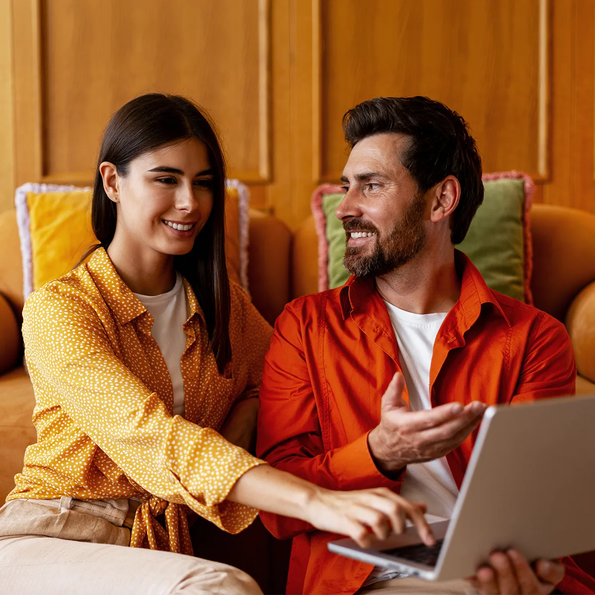 husband and wife reviewing their retirement plan together at home