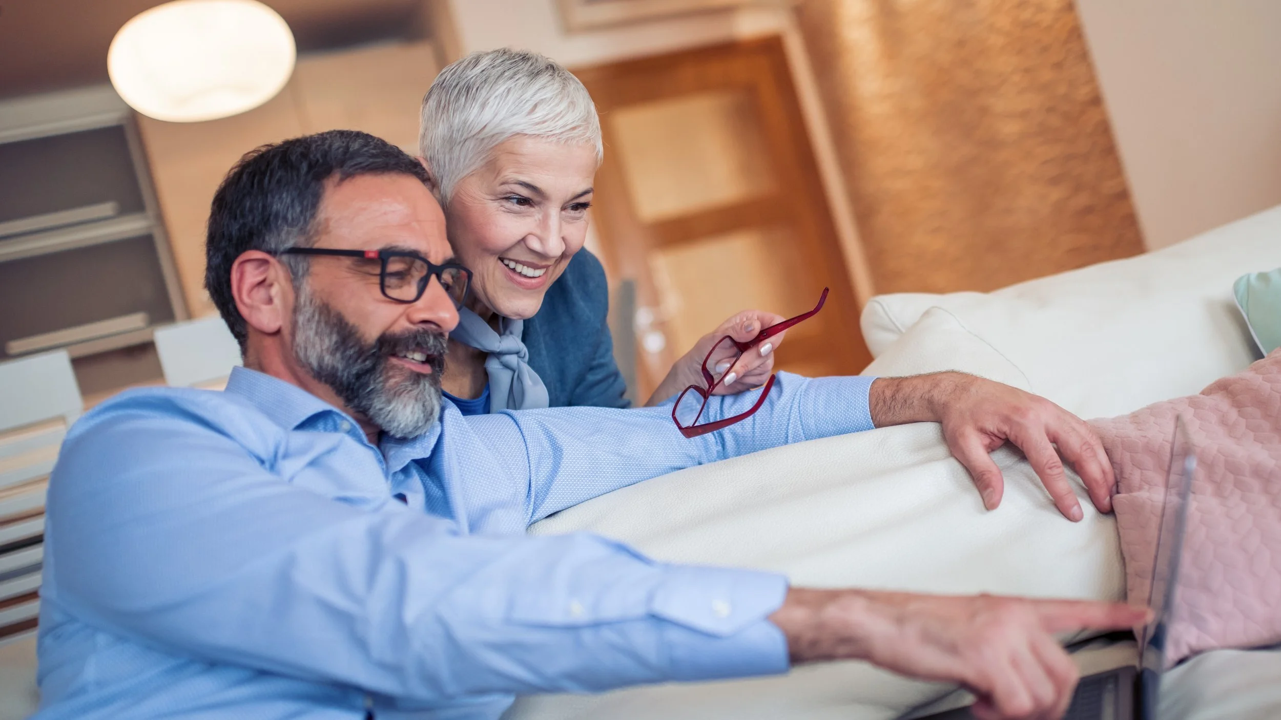 older couple looking at laptop