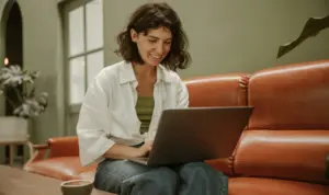 A Servant Solutions member on her computer searching her microsite