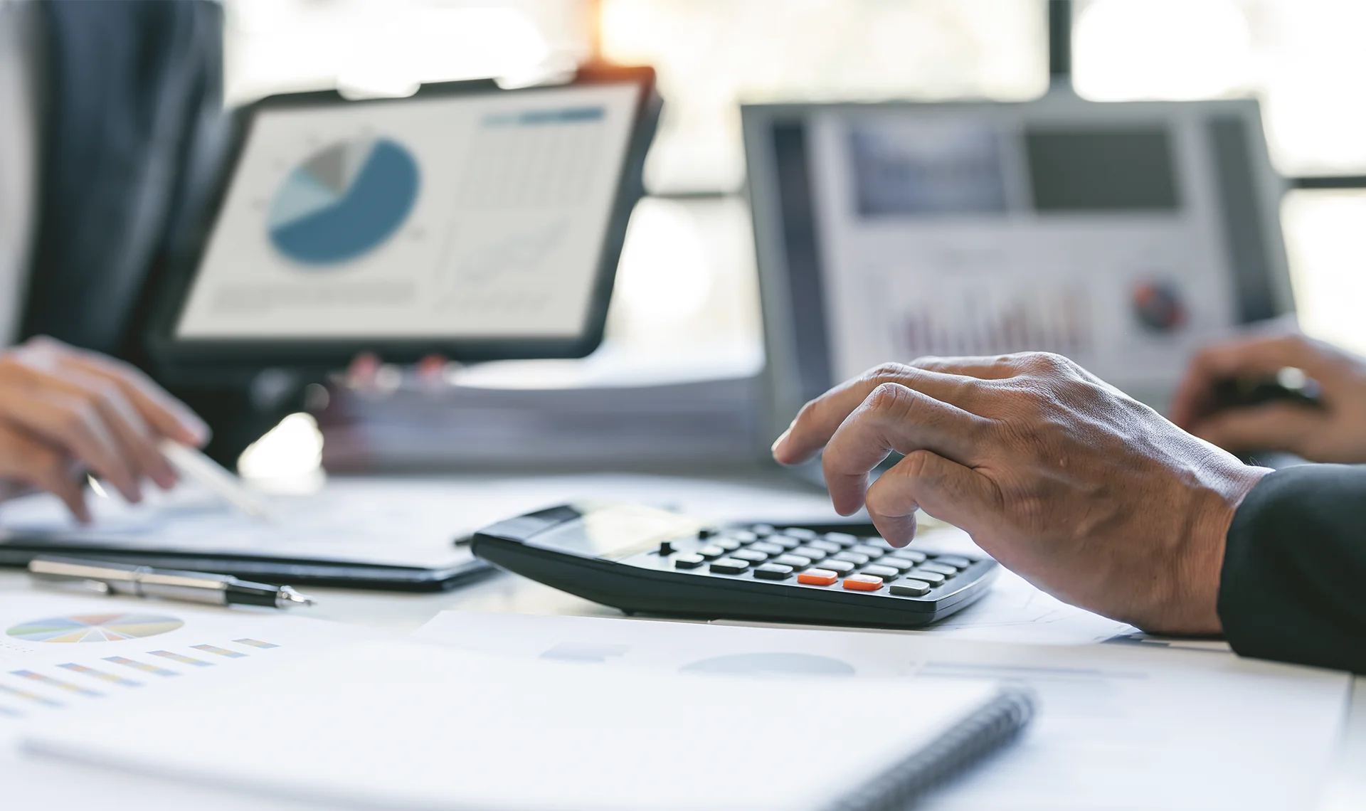 tax professionals working on minister's yearly taxes