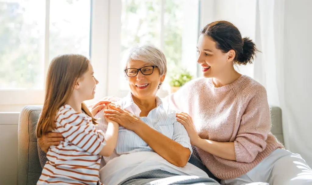 three generations of women bonding at home